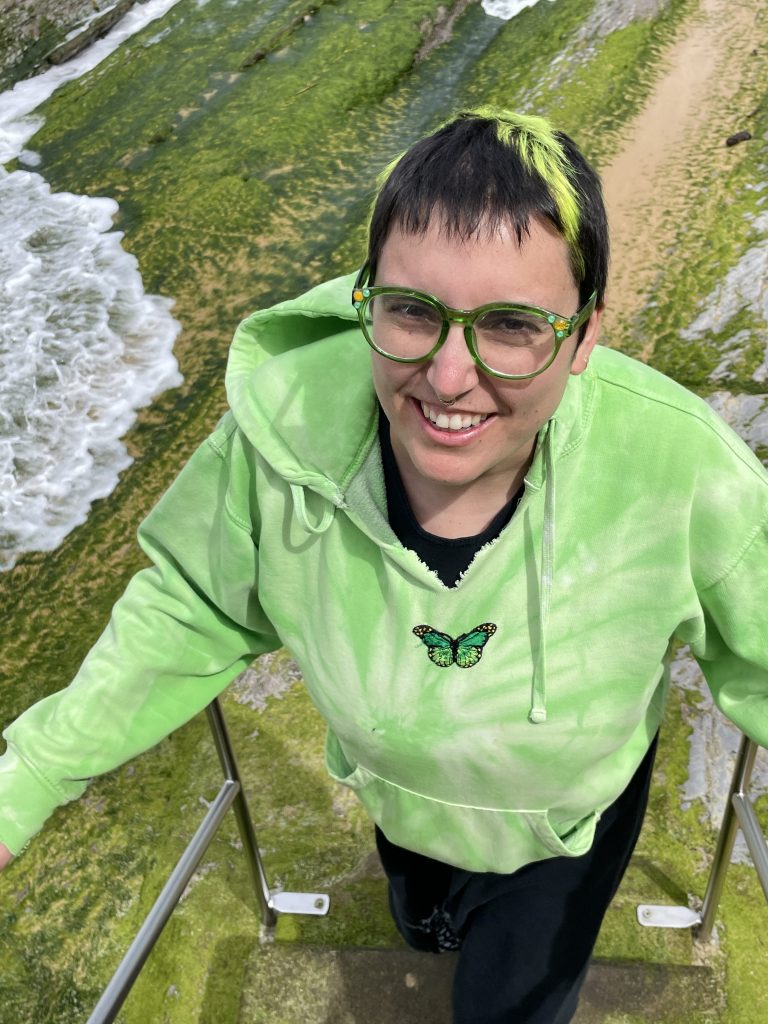 Sharrin at the beach in classic lime green